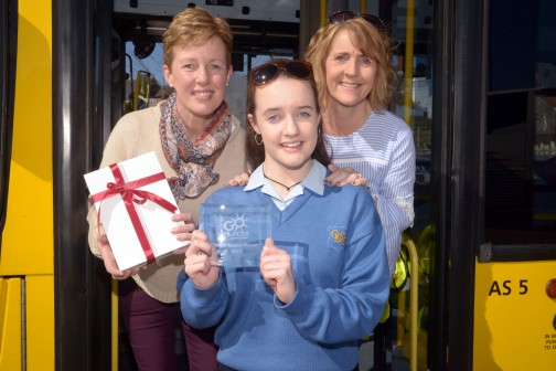 Transition year student Jane Tiernan from Christ King Secondary School in Douglas, Co. Cork has been named the winner from the South of the inaugural Bus Éireann ‘Go Places’ Competition. The competition invited TY students from around the country to submit projects – in words, photographs, or videos – about their journey to school. Pictured is Jane receiving her prize with her mum Joanna and Bus Éireann school bus regional officer Breda McDermott.