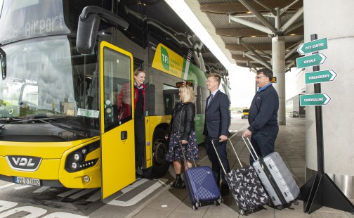 A yellow and green Bus Éireann Bus No 226 operates between Cork City and Cork Airport, driver Klaudia Minton welcomes on Bus Éireann's Fiona Connolly, Aled Williams Senior Manager Operations, Bus Eireann and Garrett Lyons Cork Airport